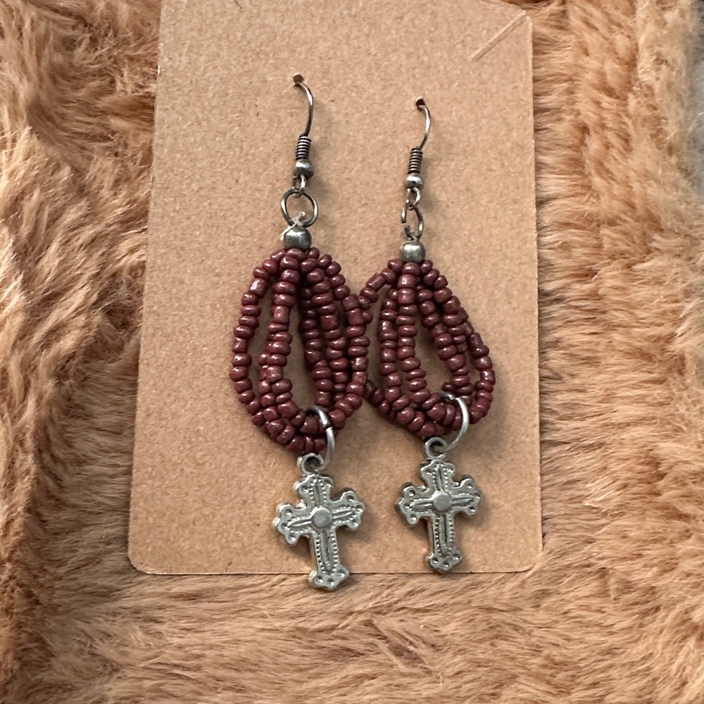 Beaded cross dangle earrings